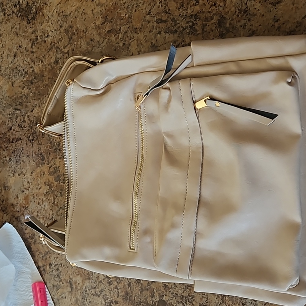 NWOT pale pink or light beige backpack